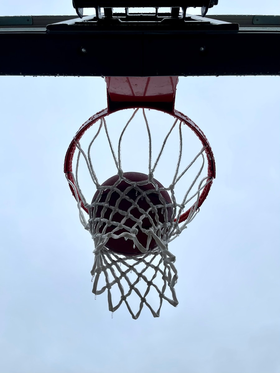 Basketball going through the net — nothing but net